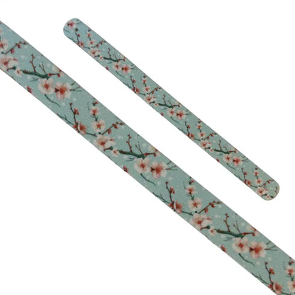 Bande décorative interchangeable en Biothane motif branches de cerisier japonais en fleurs roses sur fond vert sauge pour collier de chien.