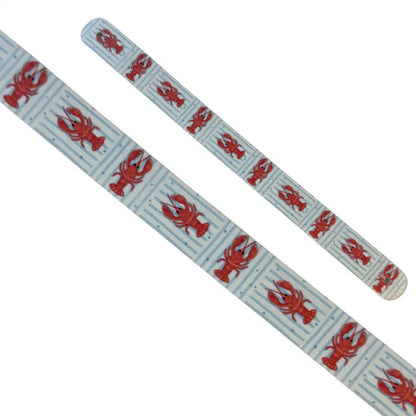 Bande décorative interchangeable en Biothane motif homards rouges et rayures marinières pour collier de chien.