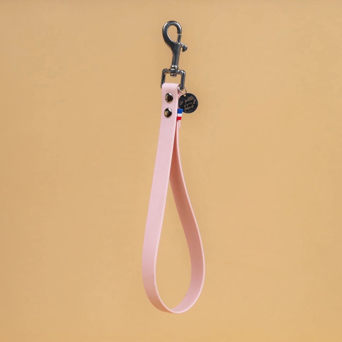 poignée laisse à mains pour chien en sangle enduite matière étanche similaire au biothane couleur rose pastel